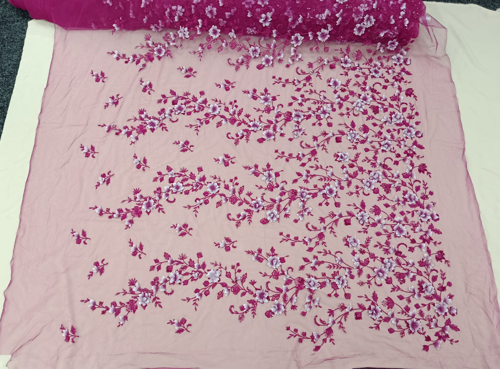 Aspect luxos al materialului Fucsia cu paiete și pietre tubulare